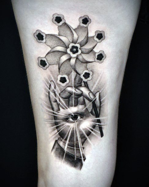 Lady With Elegant Pin Wheel Tattoo Body Art