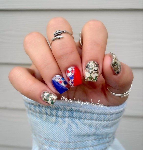 Lady With Elegant Red And Blue Nail Body Art