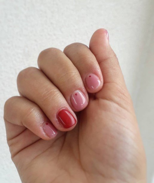 Lady With Elegant Red And Nude Nail Body Art