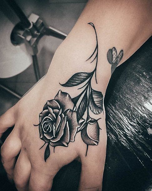 Lady With Elegant Rose Hand Tattoo Body Art