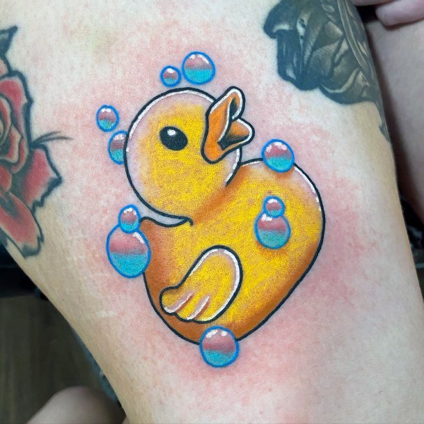 Lady With Elegant Rubber Duck Tattoo Body Art