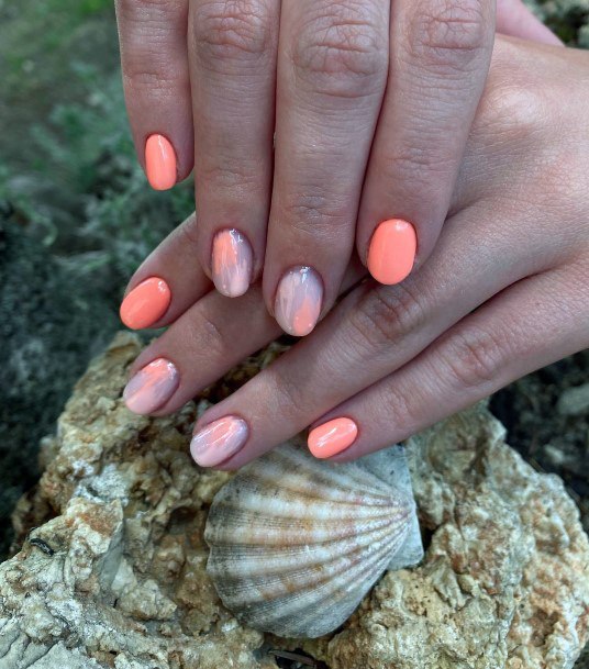 Lady With Elegant Salmon Nail Body Art