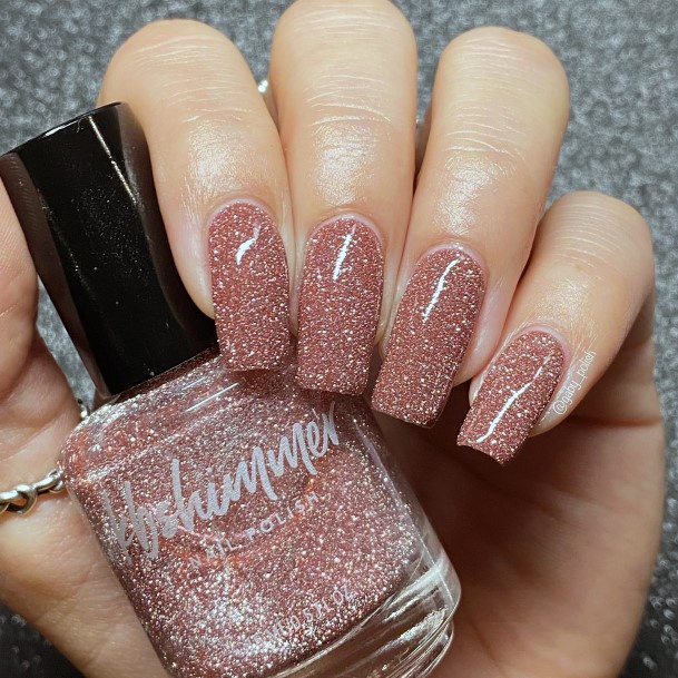 Lady With Elegant Shimmer Nail Body Art