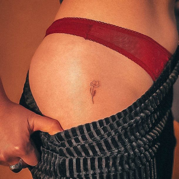 Lady With Elegant Small Hip Tattoo Body Art