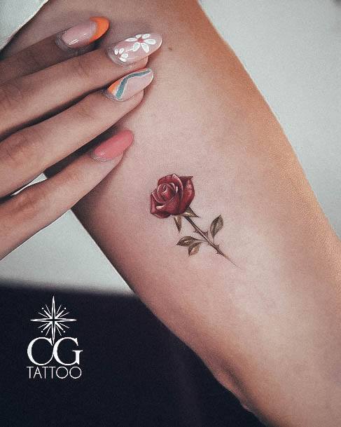 Lady With Elegant Small Rose Tattoo Body Art