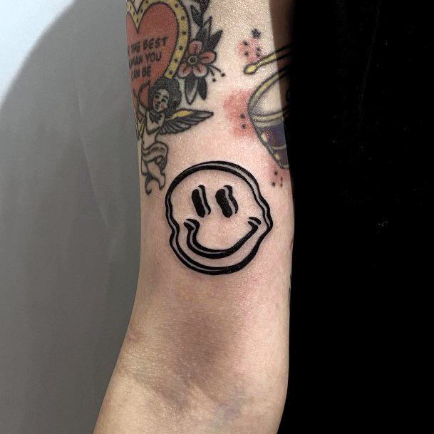 Lady With Elegant Smiley Face Tattoo Body Art