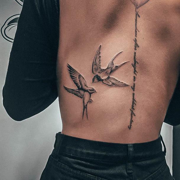 Lady With Elegant Swallow Tattoo Body Art