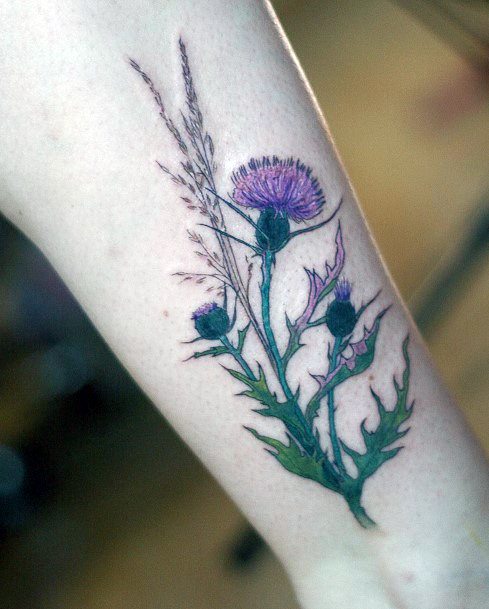 Lady With Elegant Thistle Tattoo Body Art