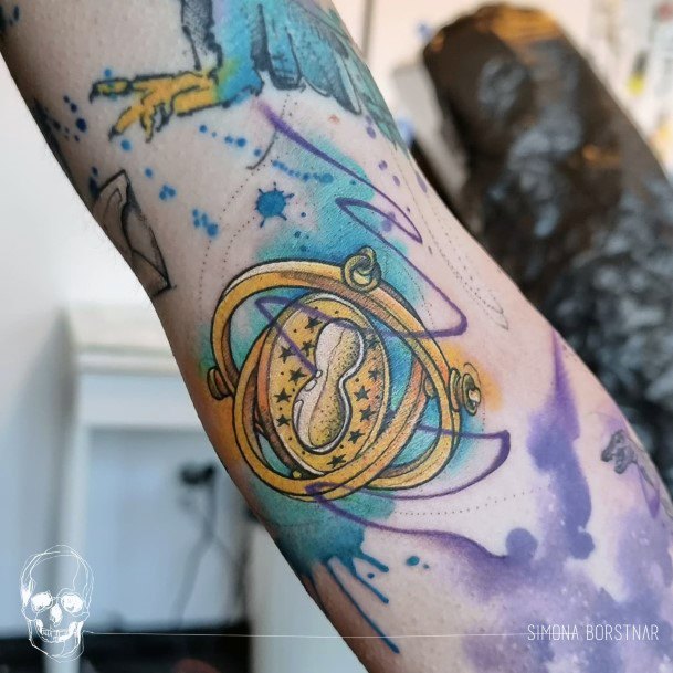 Lady With Elegant Time Turner Tattoo Body Art