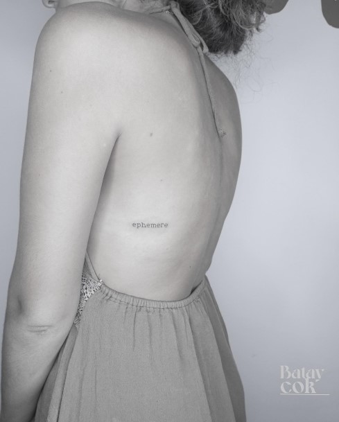 Lady With Elegant Typewriter Tattoo Body Art