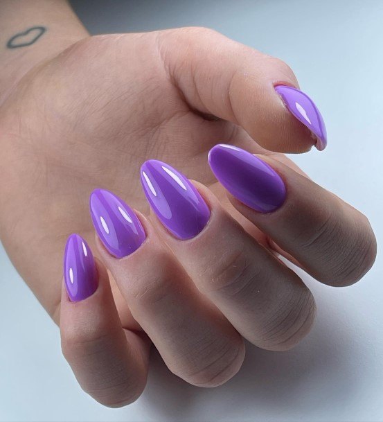 Lady With Elegant Violet Nail Body Art