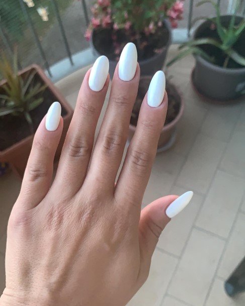 Lady With Elegant White Almond Shaped Nail Body Art