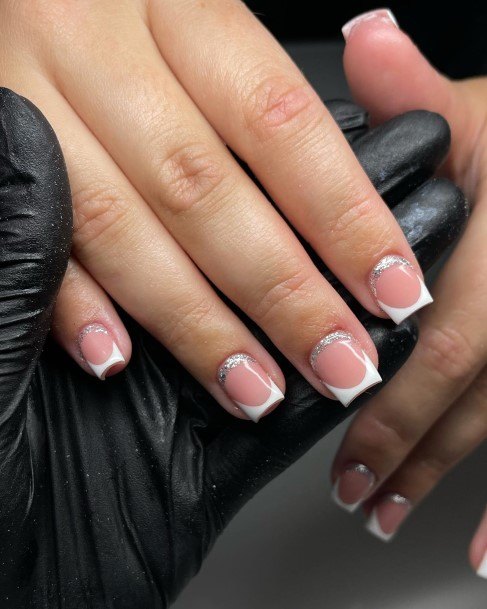 Lady With Elegant White And Silver Nail Body Art