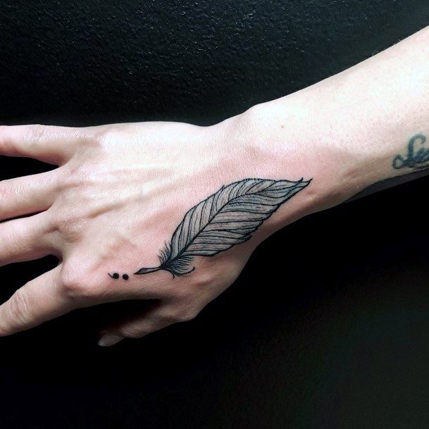 Large Feather And Semi Colon Womens Hands Tattoo