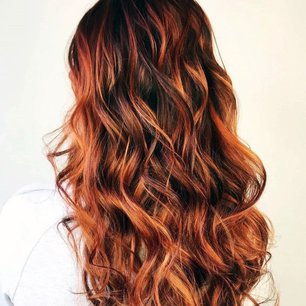 Layered And Hottest Curly Brown And Orange Highlighted Womens Hairstyle