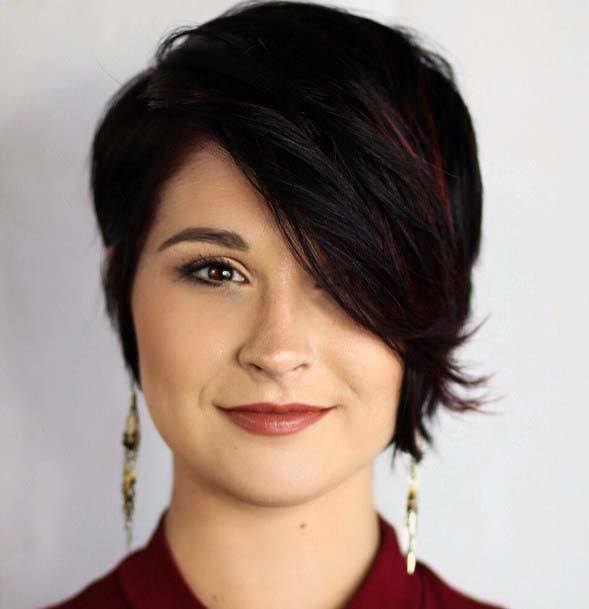Layered Pixie Cut With Side Bangs Framing A Female With Square Face
