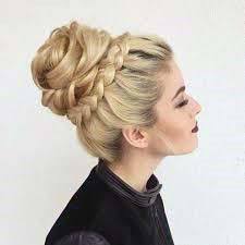 Light Blonde Female With Thick Full Hair Pulled Into Top Bun With Braided Base