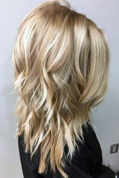 Light Blonde With Shaggy Multiple Layers Shoulder Length