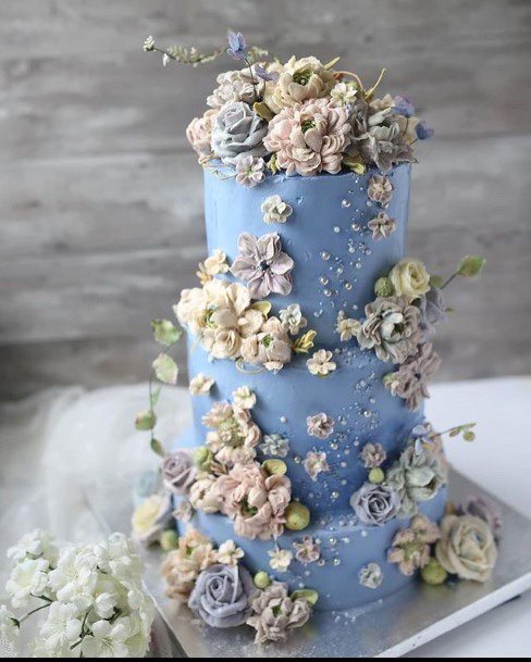 Light Blue Wedding Cake With White Flowers