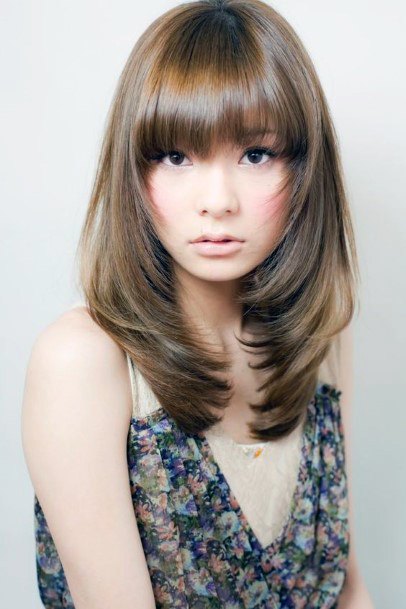 Light Brown Copper Shoulder Length With Long Bangs Airy Hairstyles For Women