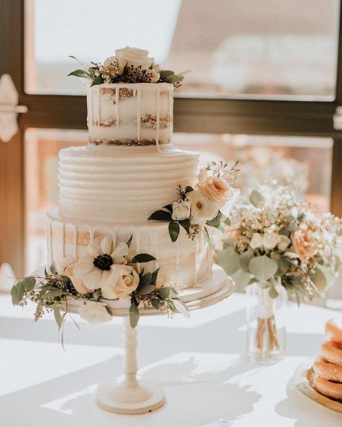 Light Cream Colored Country Wedding Cake With Roses