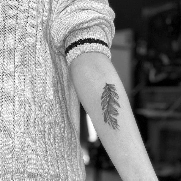 Light Grey Feather Tattoo For Women