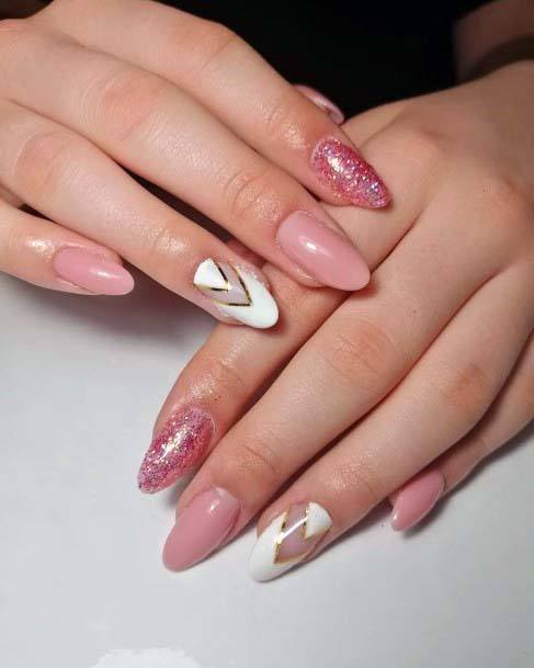 Light Pink Nails With Golden White Chevon