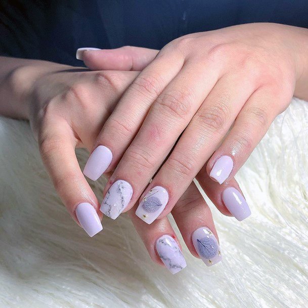 Light Purple Nails With Delicate Feather And Stone