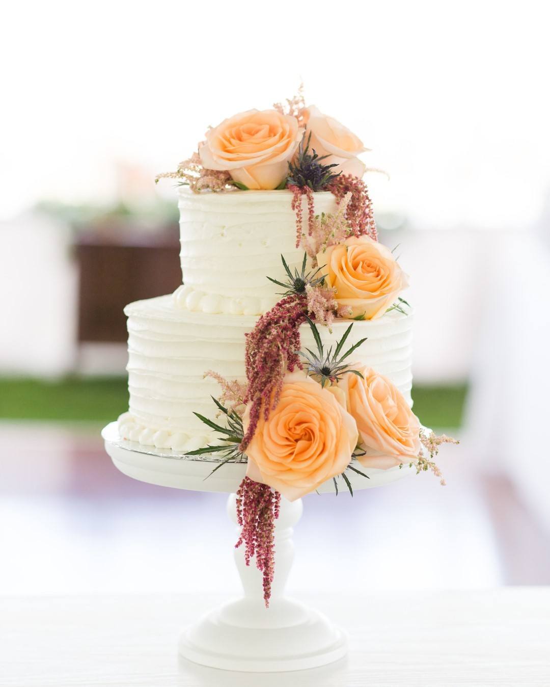 Light Yellow September Wedding Flowers On Cake