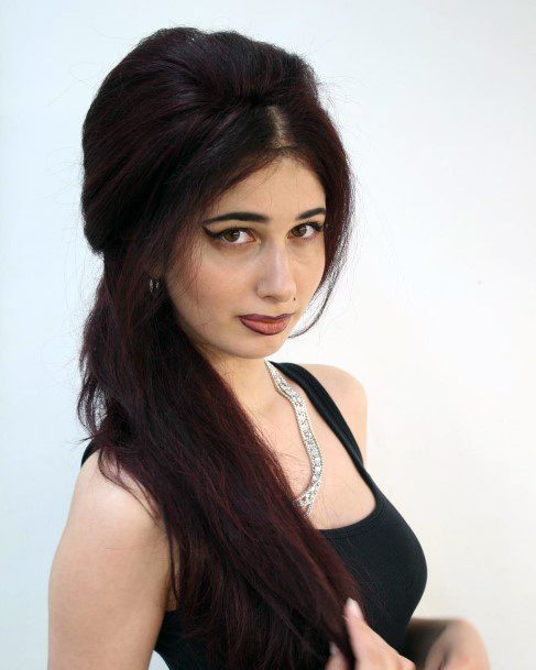 Long Black Hairstyles With Red Highlights And Small Bouffant