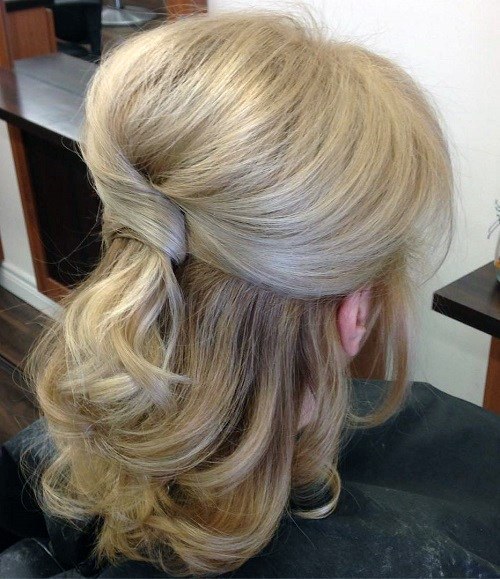 Long Blonde Female With Half Pulled Back And Pinned