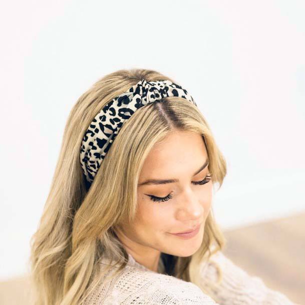 Long Blonde Haired Female With Leopard Headband