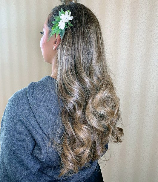 Long Curly Medium Brown Hair With Floral Accent For Women