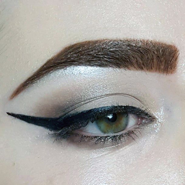 Long Eyeliner And Light Eyeshadow Women