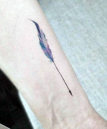 Long Feathered Tattoo Of Arrow Wrist