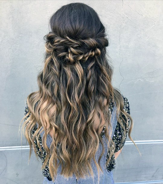 Long Haired Female With Cascading Waves Pulled Back With Hair Twists