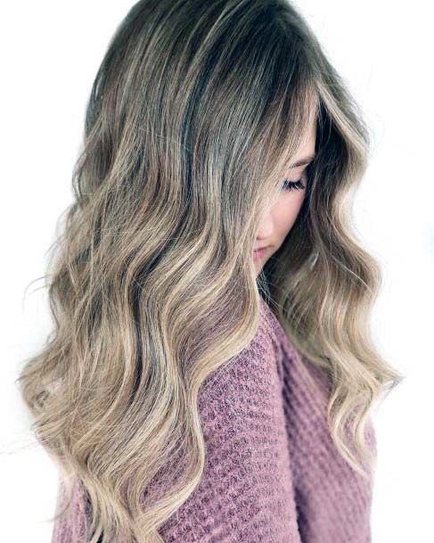 Long Haired Female With Wavy Medium Blonde Summer Hairstyle