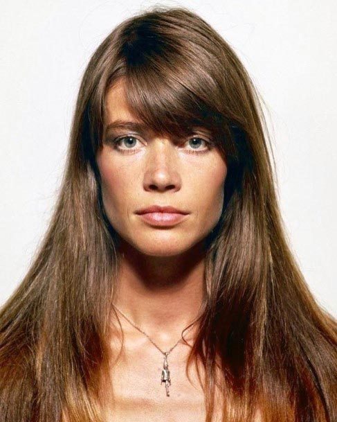 Long Layers On Dark Brown Hair With Auburn Throughout And Long Side Parted Bangs