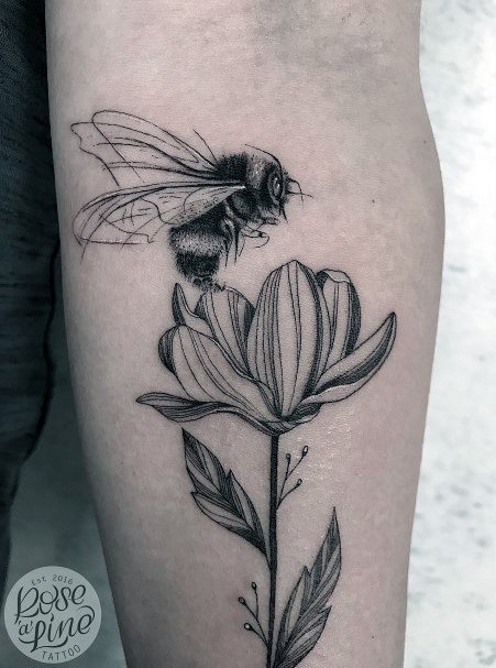 Long Stemmed Flower And Bee Tattoo For Women