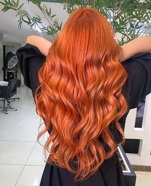 Long Wavy Hair With Light Coppery Red On Woman