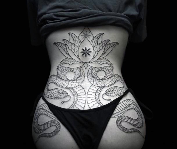 Lotus And Two Snakes Tattoo Womens Stomach