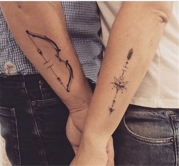 Lotus Arrow And Bow Couple Tattoo Forearms