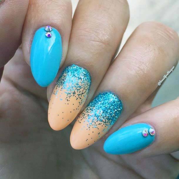 Lovely Almond Nails With Crystal Blue And Orange For Women