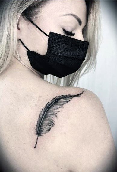 Lovely Feather Tattoo Womens Back