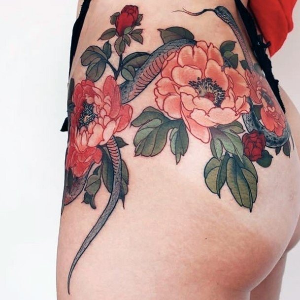 Lovely Florals And Snake Tattoo Womens Thighs