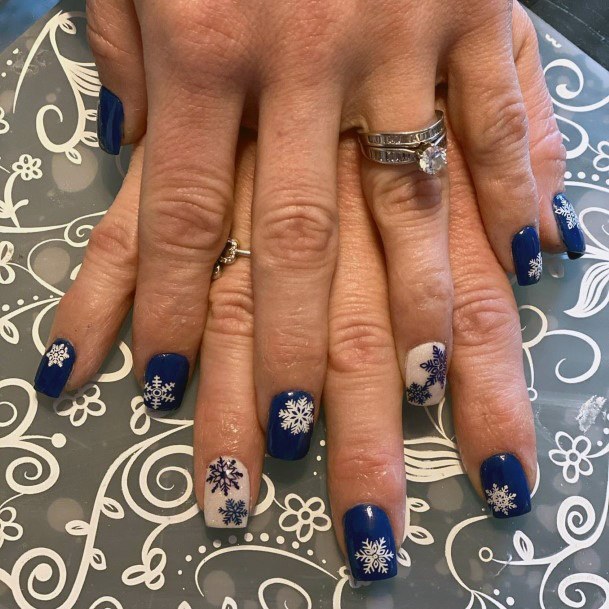 Lovely Snowflake Art On Blue White Nails For Women