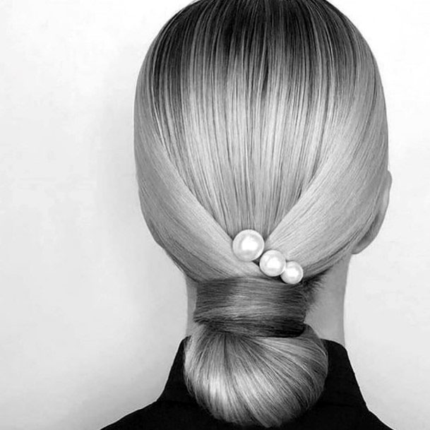 Low Hanging Chignon Hairstyle For Women