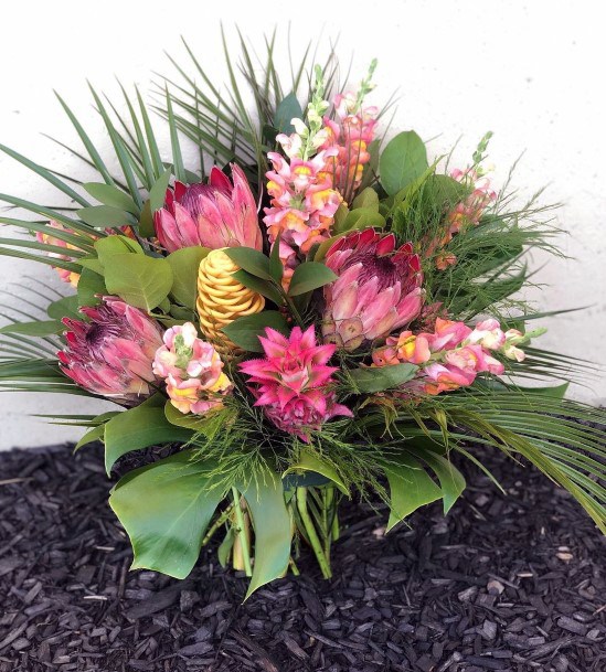 Lush Green And Light Pink Tropical Wedding Flowers