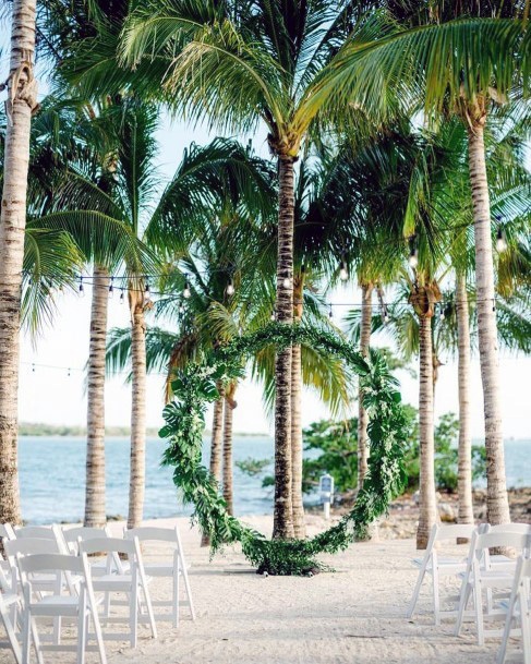 Lustrous Circle Of Life Greenery Flower Arch Beachy Wedding Ideas