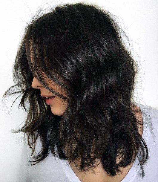 Luxurious Rich Dark Brown Layered Bouncy Women’s Haircut Ideas